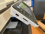 a computer that is sitting on top of a printer