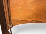 a close up of a piece of wood on a table