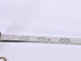 a knife and a pair of scissors on a table