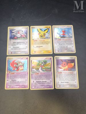 the pokemon cards are sitting on the table ready to be played