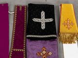 several different types of cloths are laid out on a table