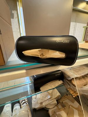 a display case with a bag of food inside of it