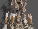an image of a chandelier with several lights hanging from it ' s sides