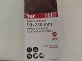 the packaging of a brown paper is on a white surface