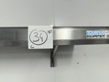 a picture of a stainless steel shelf with a sticker on it