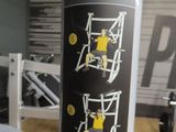 a sticker on a pole with a picture of a bench press