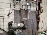 a machine that is sitting inside of a garage
