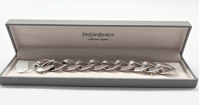 the bracelet is in a box on a white surface