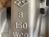 an image of a close up of a metal valve on a table