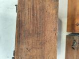 two pieces of wood that are on the wall