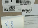 a box with a receipt on it sitting on a table