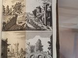 someone is holding a book open to show pictures of a city