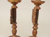pair of antique wooden candlesticks with carved wood bases