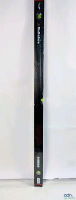 an image of a close up of a toothbrush on a white surface