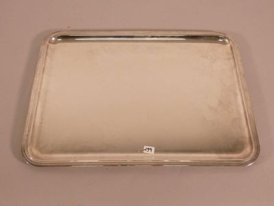 silver plated tray with handle and handles on a table