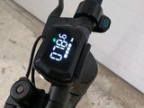 a close up of a bike with a digital display on the handlebars