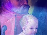 a painting of a man holding a baby in his lap