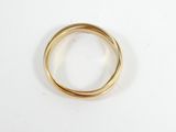 a close up of a gold ring on a white surface