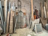 several pieces of wood are stacked up in a room