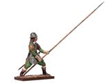 a figurine of a man in armor holding a spear