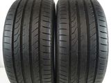 a pair of tires on a white background with the words vendu par lot de 2