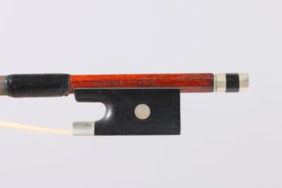 an image of a violin bow with a string attached to it