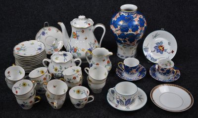 many different types of tea and coffee cups and saucers