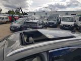 a lot of cars that are parked in a parking lot