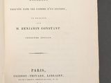 an open book with a black and white title on it