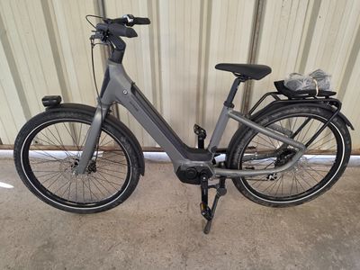 a bike that is parked in front of a building