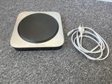 a black and silver electronic device on the floor