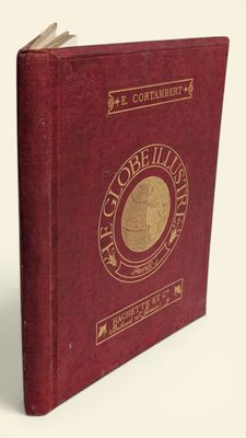 un vieux livre rouge orné d'un sceau doré sur la couverture