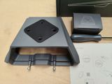 a picture of a desk with a laptop and a mouse on it