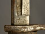 a close up of a metal object with a rusted surface