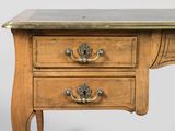 an old wooden desk with two drawers and a marble top