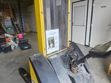 an image of a forklift in a warehouse