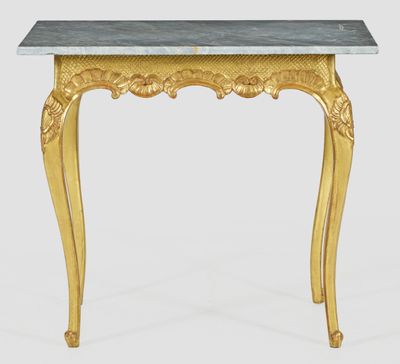 une table console en or avec un plateau en marbre sur fond blanc