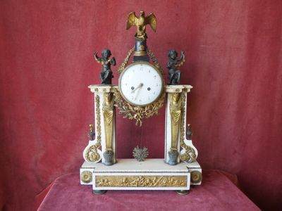 a clock that is sitting on top of a table