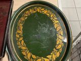 a green and yellow plate sitting on top of a table