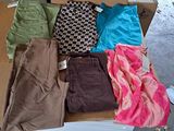 a box full of clothes that is sitting on a table