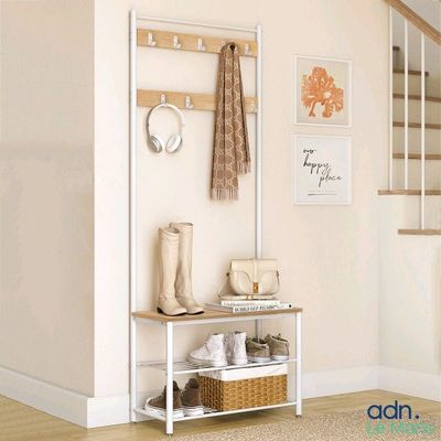 a picture of a hallway with a coat rack and a coat rack