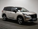 the white nissan suv is parked in a room with a checkered floor