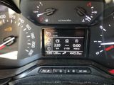 a close up of a car dashboard with a speedometer