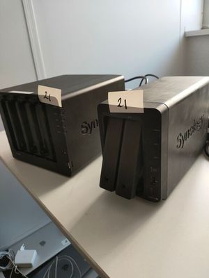 two boxes that are sitting on a table