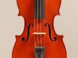 a close up of a violin with a bow on a white background