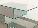 a glass table with two drawers and a drawer underneath it