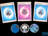 three cards with different designs on them on a black background