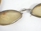 a pair of glasses that are sitting on a table
