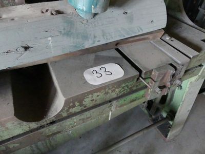 an old machine with a number on the side of it