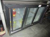 a refrigerator that has a lot of bottles inside of it